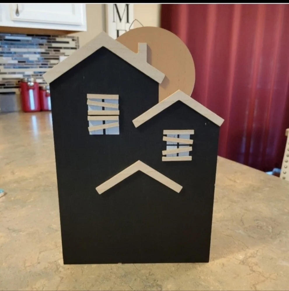 Target bullseye haunted house wooden sign